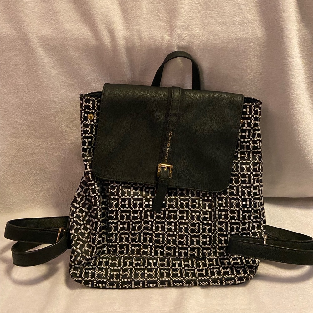 Tommy Hilfiger backpack with adjustable straps.Monogrammed blue & black.